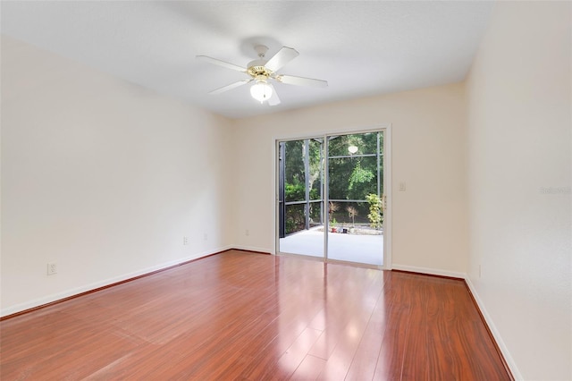 20542 Queen Alexandra Dr, Leesburg, FL 34748 - empty room with wood finished floors and a ceiling fan