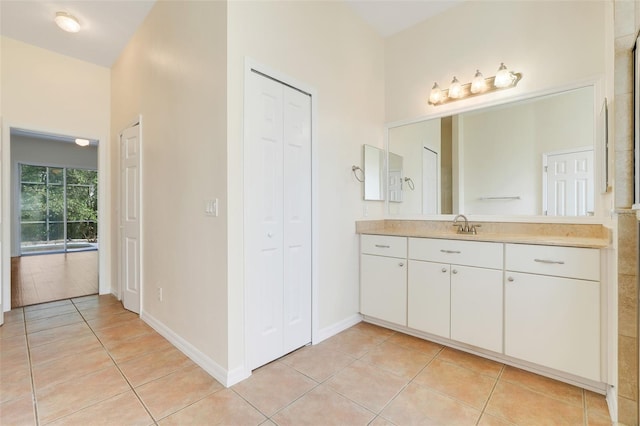 20542 Queen Alexandra Dr, Leesburg, FL 34748 - full bath with a closet, vanity, and tile patterned flooring