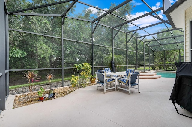 20542 Queen Alexandra Dr, Leesburg, FL 34748 - view of patio with a hot tub, an outdoor pool, and glass enclosure