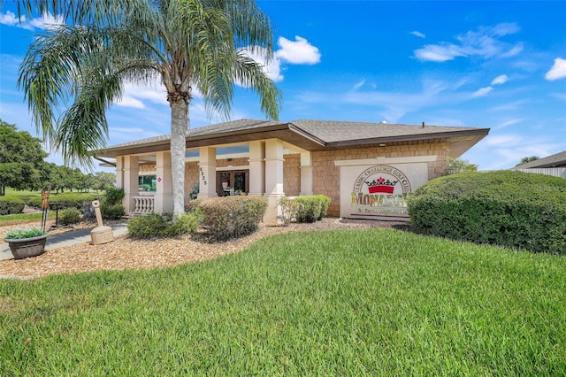 20542 Queen Alexandra Dr, Leesburg, FL 34748 - view of front facade with a front lawn and french doors