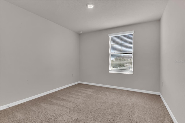 1866 Red Canyon Dr, Kissimmee, FL 34744 - carpeted empty room featuring baseboards