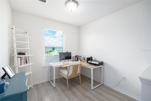 8164 Wood Sage Dr, Winter Garden, FL 34787 - office with light wood-style floors and baseboards