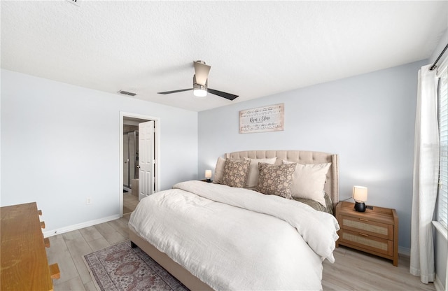 8164 Wood Sage Dr, Winter Garden, FL 34787 - bedroom with light wood-type flooring and a ceiling fan