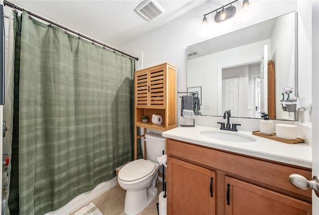 8164 Wood Sage Dr, Winter Garden, FL 34787 - full bath with vanity, tile patterned flooring, a textured ceiling, and curtained shower