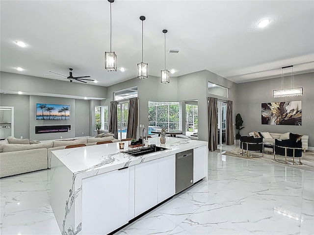 704 Forest View Ct, Winter Springs, FL 32708 - kitchen with dishwasher, light marble finish flooring, open floor plan, white cabinets, and recessed lighting