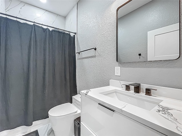 704 Forest View Ct, Winter Springs, FL 32708 - full bathroom with a textured wall, vanity, and a shower with curtain
