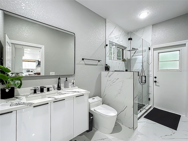 704 Forest View Ct, Winter Springs, FL 32708 - full bathroom with a textured wall, vanity, a marble finish shower, healthy amount of natural light, and a textured ceiling