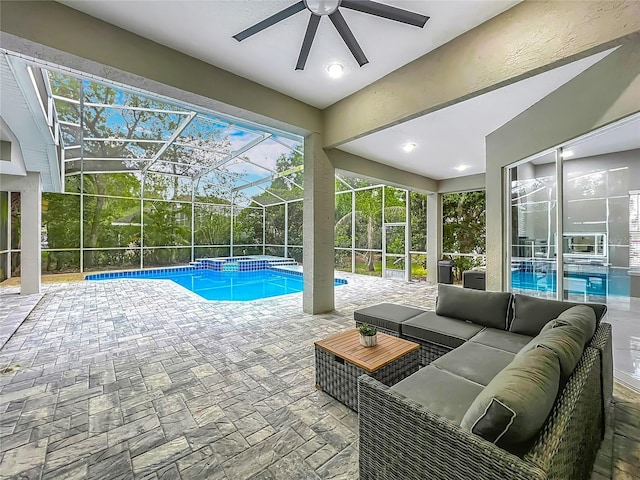 704 Forest View Ct, Winter Springs, FL 32708 - view of pool featuring ceiling fan, outdoor lounge area, a patio, a pool with connected hot tub, and a lanai