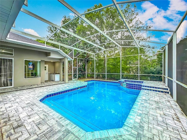 704 Forest View Ct, Winter Springs, FL 32708 - view of swimming pool with a patio area, a pool with connected hot tub, and a lanai