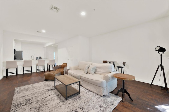 6931 Sperone St, Orlando, FL 32819 - living area with wood finished floors and recessed lighting