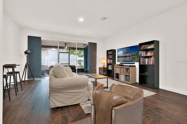 6931 Sperone St, Orlando, FL 32819 - living area with wood finished floors and recessed lighting