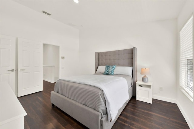 6931 Sperone St, Orlando, FL 32819 - bedroom with wood finished floors and recessed lighting