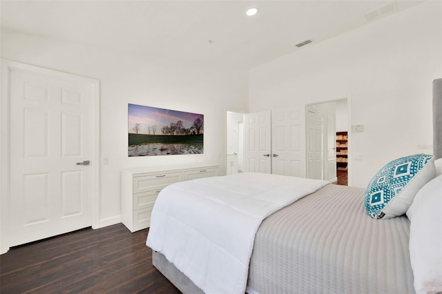 6931 Sperone St, Orlando, FL 32819 - bedroom featuring dark wood finished floors and recessed lighting