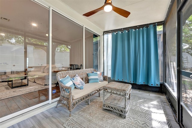 6931 Sperone St, Orlando, FL 32819 - sunroom / solarium featuring a ceiling fan and plenty of natural light