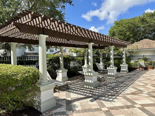 6931 Sperone St, Orlando, FL 32819 - view of patio / terrace featuring a pergola