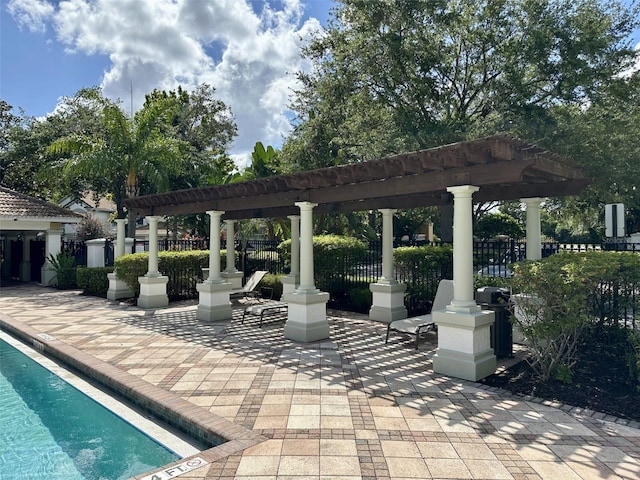 6931 Sperone St, Orlando, FL 32819 - view of patio / terrace with a pergola and a pool