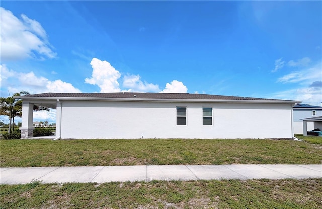 6300 Chirpine Ln, Saint Cloud, FL 34771 - view of home's exterior with stucco siding and a yard
