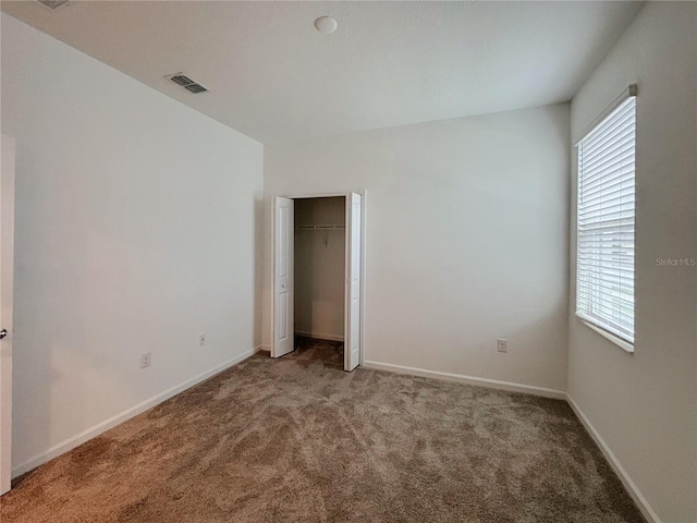 6300 Chirpine Ln, Saint Cloud, FL 34771 - unfurnished bedroom featuring carpet floors and a closet