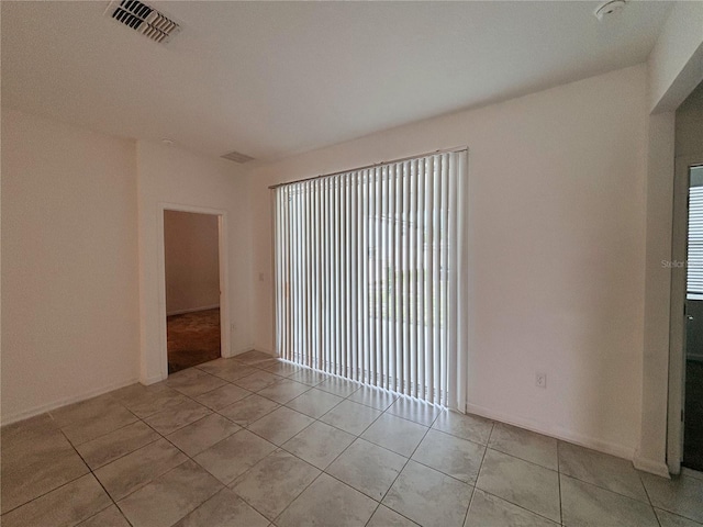 6300 Chirpine Ln, Saint Cloud, FL 34771 - unfurnished room with plenty of natural light and light tile patterned floors
