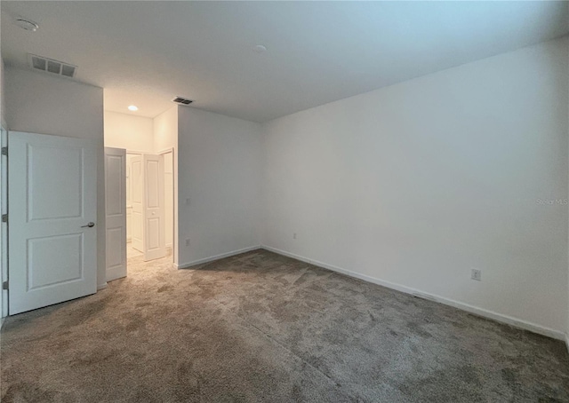 6300 Chirpine Ln, Saint Cloud, FL 34771 - carpeted empty room featuring baseboards and recessed lighting