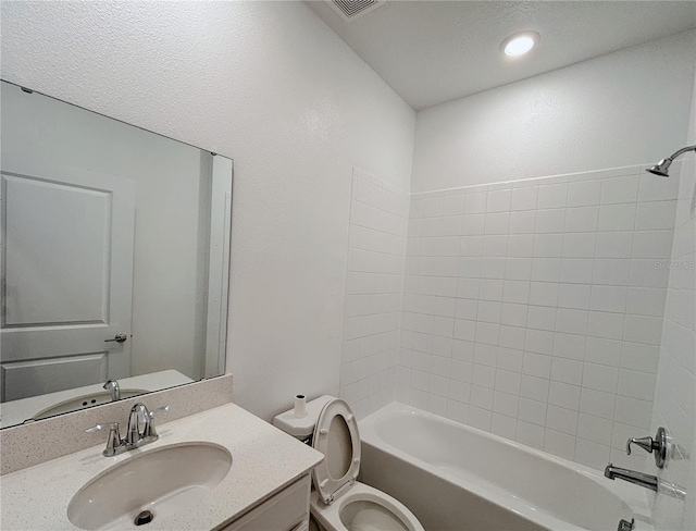 6300 Chirpine Ln, Saint Cloud, FL 34771 - bathroom featuring vanity and  shower combination