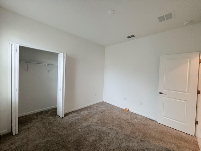 6300 Chirpine Ln, Saint Cloud, FL 34771 - unfurnished bedroom featuring carpet flooring and a closet
