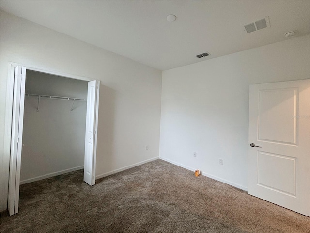 6300 Chirpine Ln, Saint Cloud, FL 34771 - unfurnished bedroom featuring carpet flooring and a closet