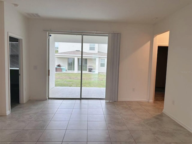6300 Chirpine Ln, Saint Cloud, FL 34771 - spare room featuring a smoke detector and light tile patterned floors