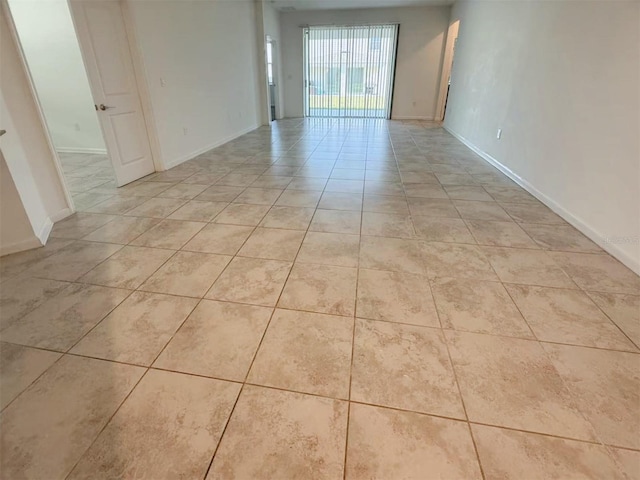 6300 Chirpine Ln, Saint Cloud, FL 34771 - unfurnished room featuring light tile patterned flooring and baseboards
