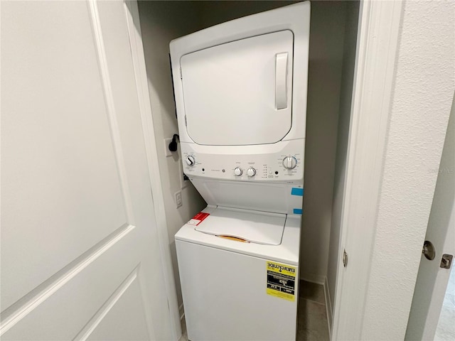 6300 Chirpine Ln, Saint Cloud, FL 34771 - washroom with stacked washer and clothes dryer