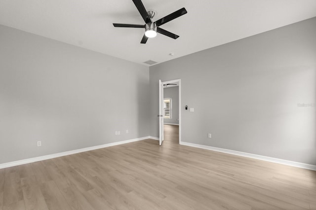 13658 Hidden Forest Cir, Orlando, FL 32828 - unfurnished room with a ceiling fan and light wood-type flooring