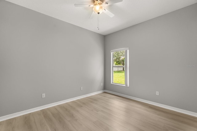 13658 Hidden Forest Cir, Orlando, FL 32828 - spare room with light wood-style flooring and a ceiling fan