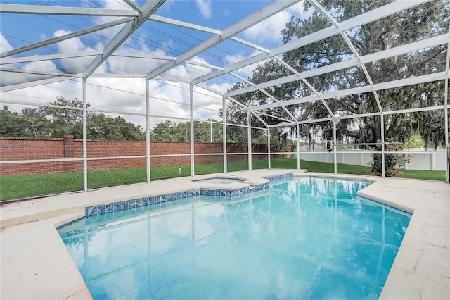 2800 Woodsmere Ct, Kissimmee, FL 34746 - view of pool with a fenced backyard, a lanai, a patio area, and a pool with connected hot tub