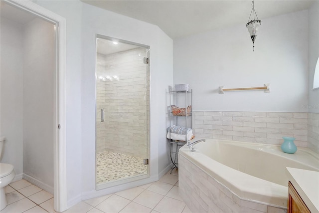2800 Woodsmere Ct, Kissimmee, FL 34746 - full bathroom featuring tile patterned flooring, a shower stall, a bath, and vanity