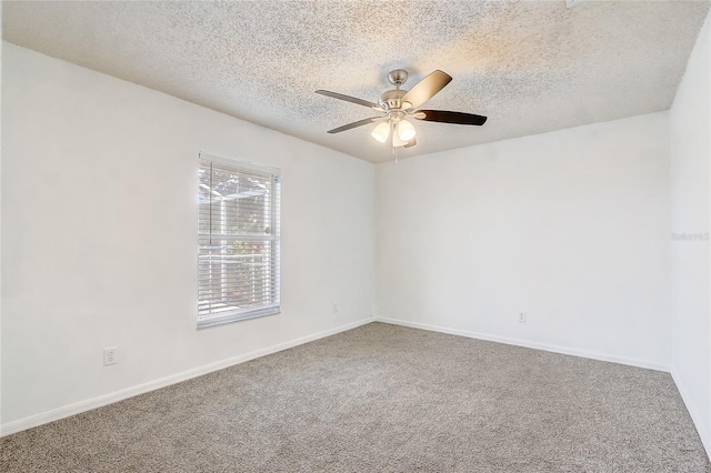 2800 Woodsmere Ct, Kissimmee, FL 34746 - unfurnished room featuring carpet flooring, a ceiling fan, and a textured ceiling