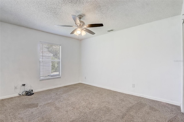 2800 Woodsmere Ct, Kissimmee, FL 34746 - empty room featuring carpet, a ceiling fan, and a textured ceiling