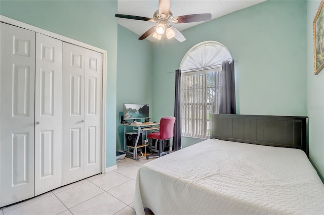2800 Woodsmere Ct, Kissimmee, FL 34746 - tiled bedroom featuring a closet, a desk, and a ceiling fan