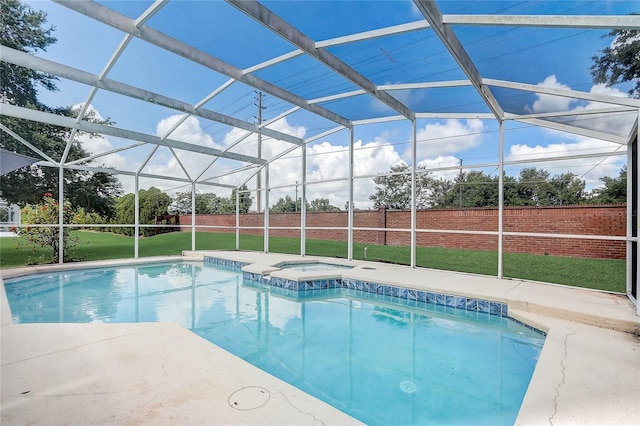 2800 Woodsmere Ct, Kissimmee, FL 34746 - view of swimming pool with an in-ground hot tub and a lanai