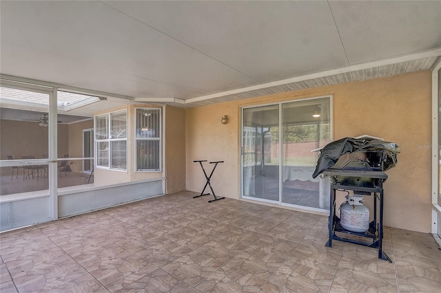 2800 Woodsmere Ct, Kissimmee, FL 34746 - unfurnished sunroom featuring a ceiling fan