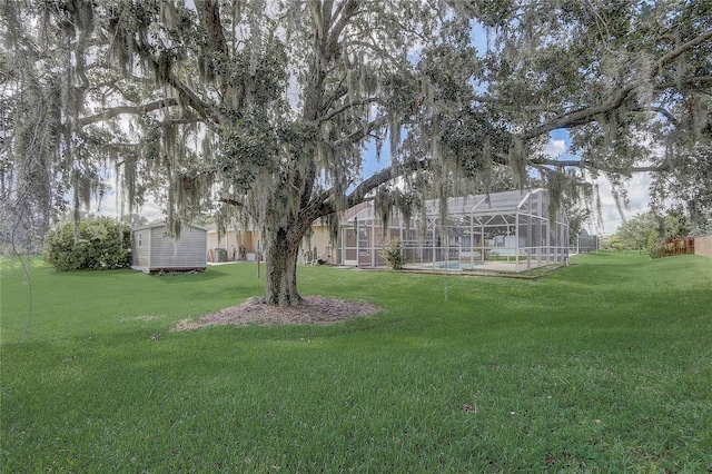 2800 Woodsmere Ct, Kissimmee, FL 34746 - view of grassy yard featuring a storage shed