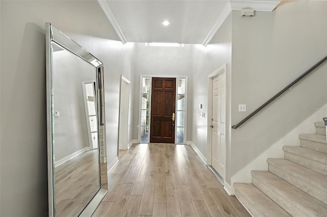 1769 Turnberry Ter, Orlando, FL 32804 - entrance foyer featuring stairs, light wood-style flooring, and recessed lighting