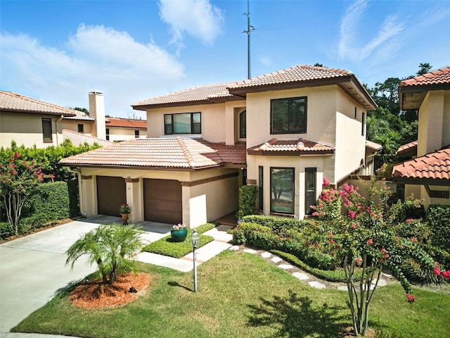 1769 Turnberry Ter, Orlando, FL 32804 - mediterranean / spanish house with stucco siding, a tiled roof, concrete driveway, a garage, and a front lawn