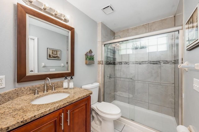 14301 Bending Branch Ct, Orlando, FL 32824 - bathroom featuring a shower stall, vanity, and tile patterned floors