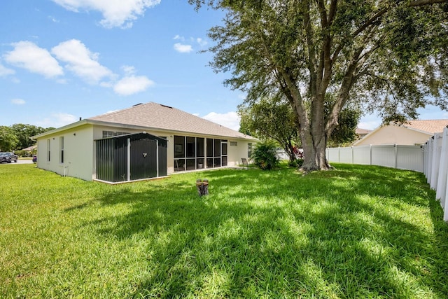 14301 Bending Branch Ct, Orlando, FL 32824 - view of yard featuring a sunroom