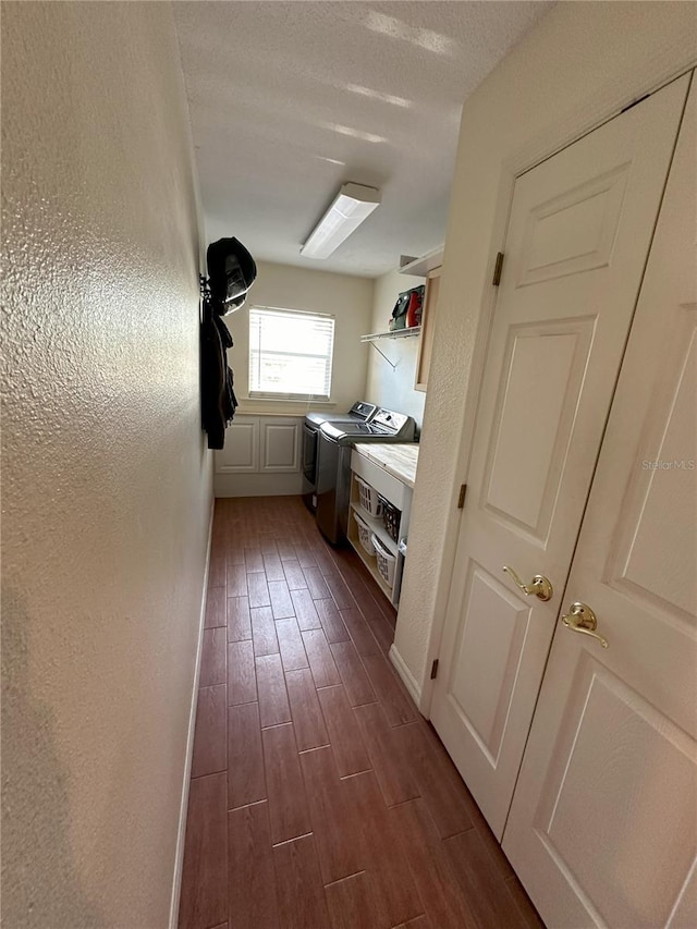 1140 Odoniel Loop S, Lakeland, FL 33809 - laundry area with separate washer and dryer, dark wood-type flooring, and a textured wall