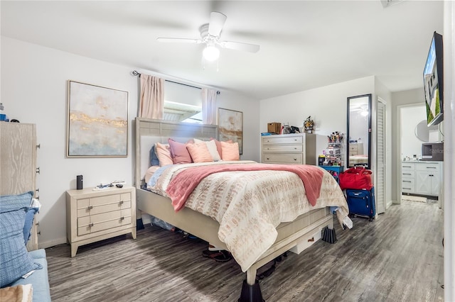 1501 SW 18th Dr, Boynton Beach, FL 33426 - bedroom with wood finished floors, a ceiling fan, and ensuite bath