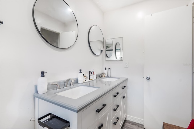 1501 SW 18th Dr, Boynton Beach, FL 33426 - full bathroom with double vanity and baseboards