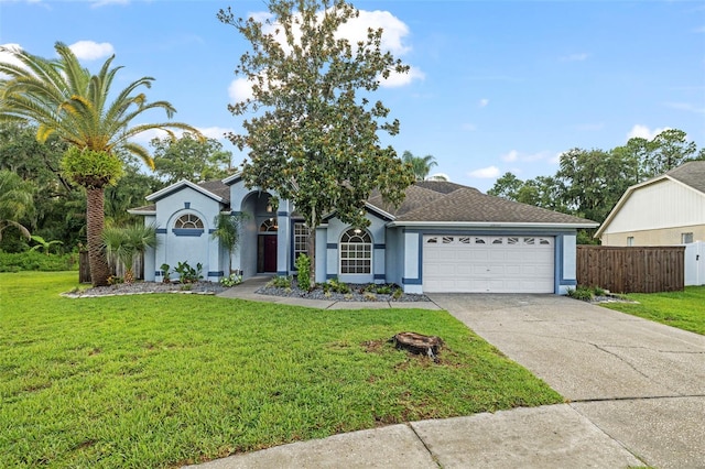 28707 Raleigh Pl, Wesley Chapel, FL 33545 - view of front of house featuring an attached garage, stucco siding, concrete driveway, and a shingled roof