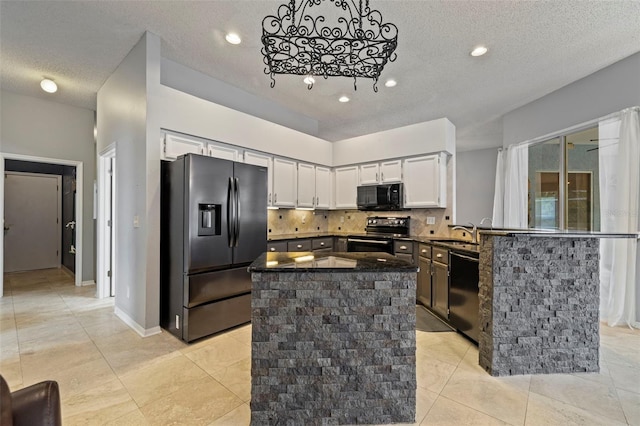 28707 Raleigh Pl, Wesley Chapel, FL 33545 - kitchen featuring fridge with ice dispenser, black microwave, electric range, dishwashing machine, and tasteful backsplash