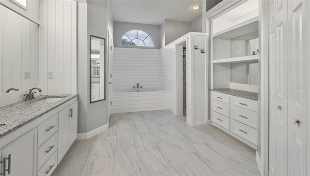 28707 Raleigh Pl, Wesley Chapel, FL 33545 - full bath featuring vanity, a bath, and marble finish flooring